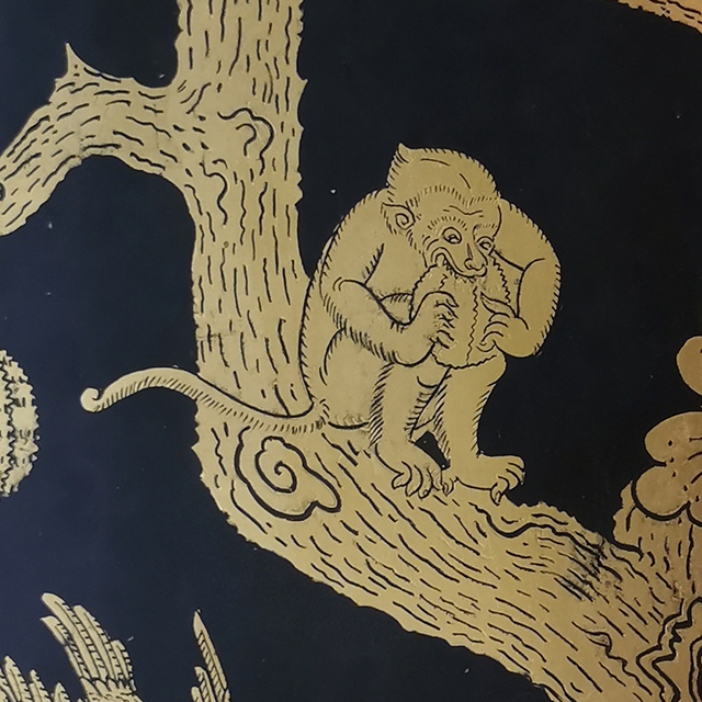 Thai Motif: Monkry eating Durian