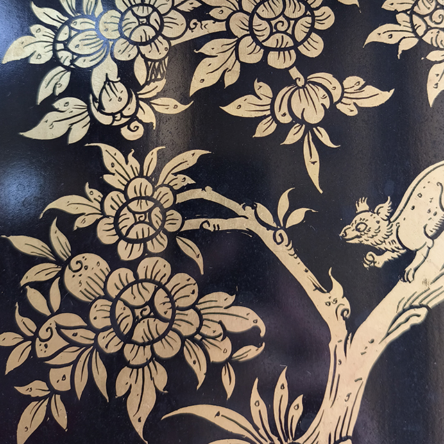 Thai Motif: flowers and squirrel